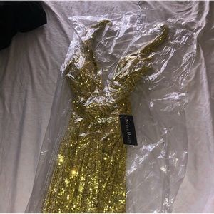 Brand New stunning dress that’s made by Nicole Bakti